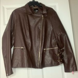 Leather jacket, Size 1X, zippered sleeves and buckles on front . Worn once